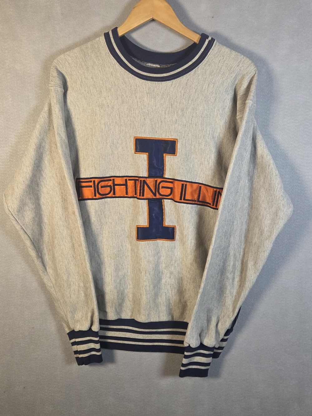 Bruzer with navy and orange striped trim and a "Fighting Illini" logo (S581)